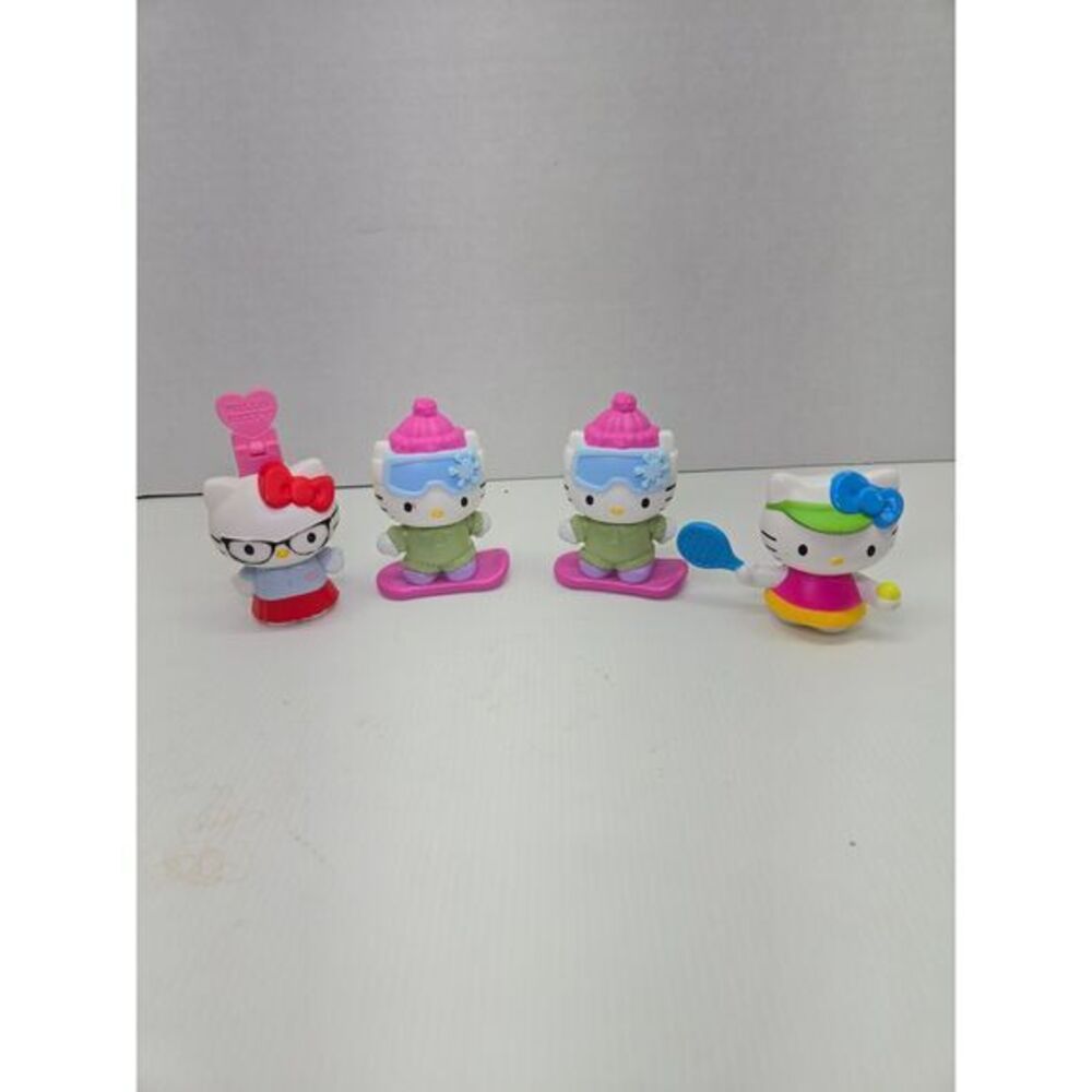 Hello Kitty 2011 & 2013 Collectible Figurines Set,‎ Pink Bracelet, 2 bobblehead